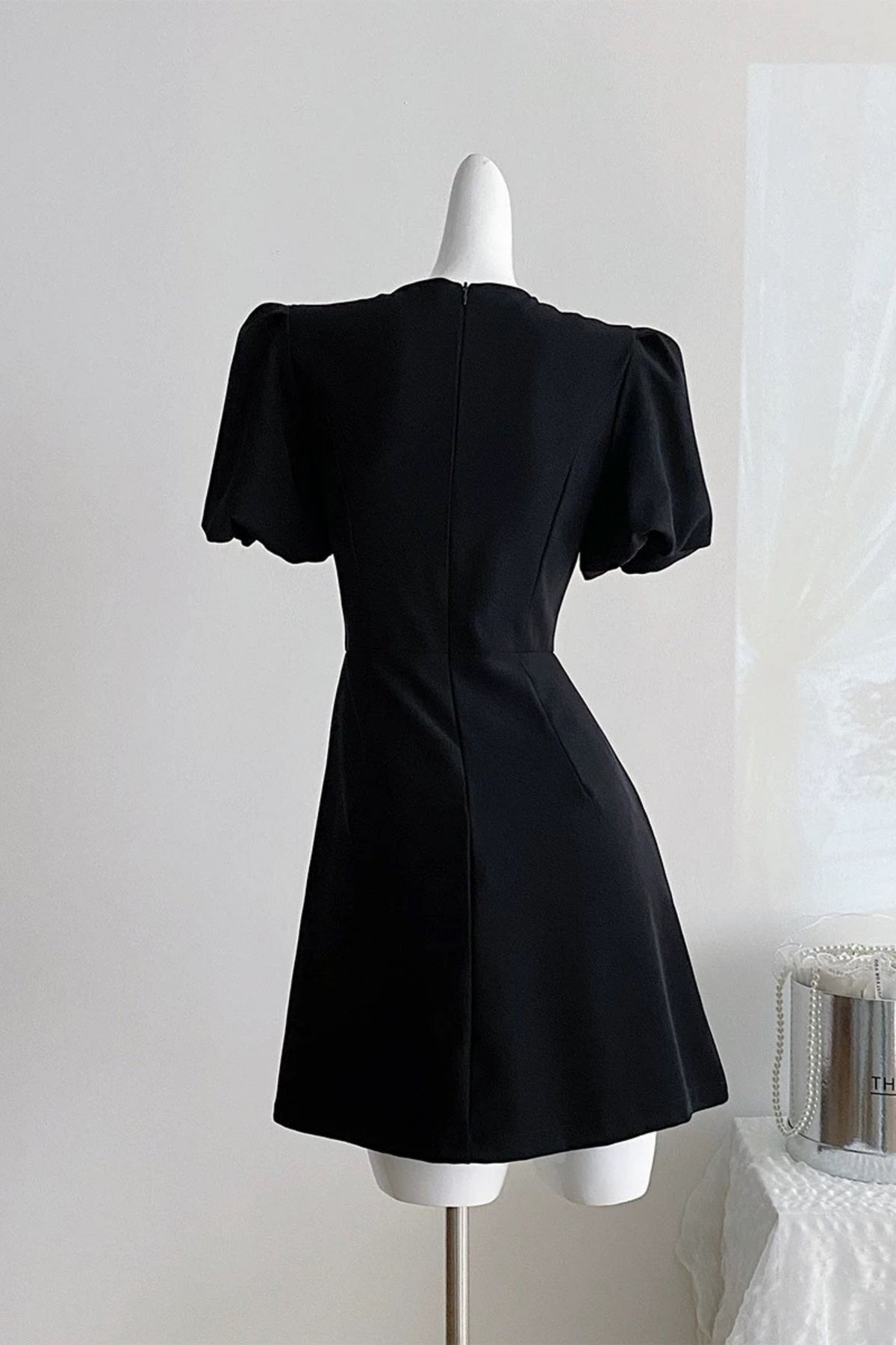 Vanessa Bow Puff Sleeve Mini Dress In Black Flowering Girl