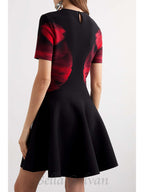 Jacquard-knit mini dress in black Flowering Girl