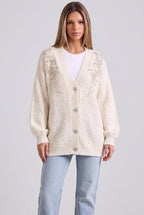 Cream Bouclé Knit Oversized Cardigan with Pearl Shoulder Embellishments Flowering Girl