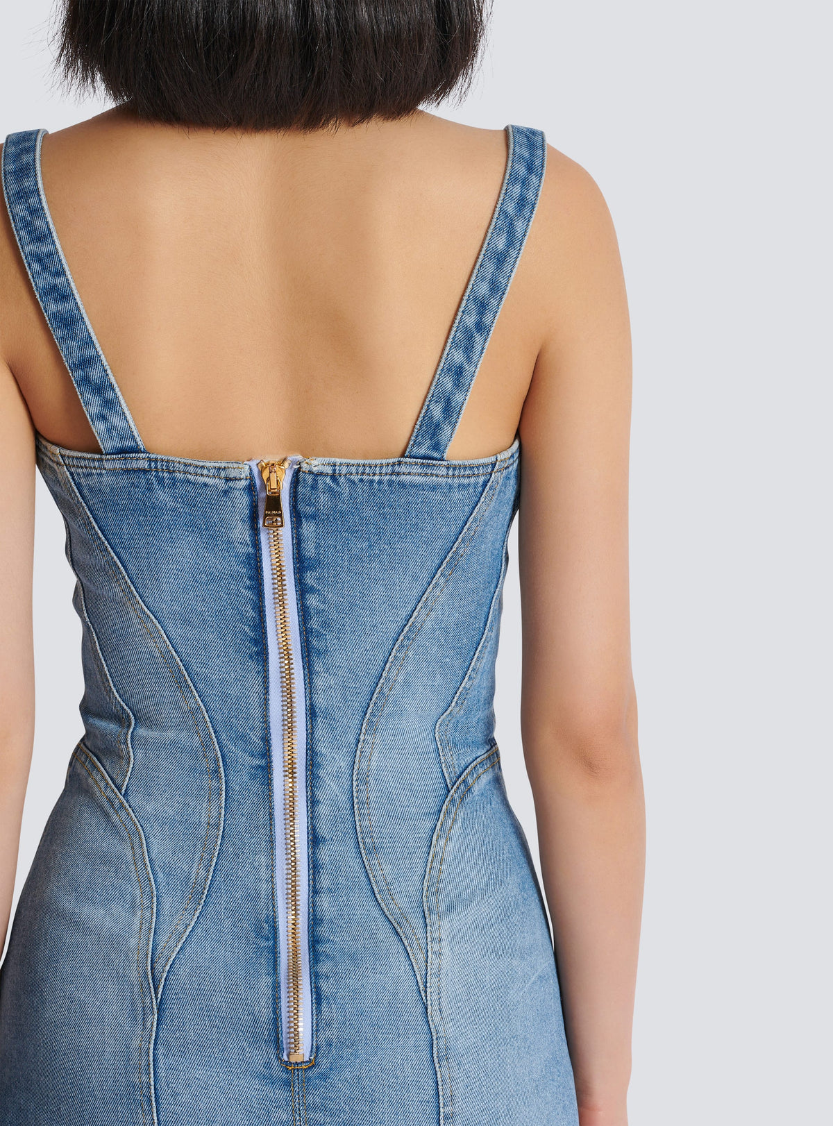 Buttoned denim mini dress in blue Flowering Girl