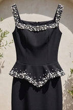 Black Heavy Crepe Column Gown with Structured Peplum and Pearl Embellishments Flowering Girl
