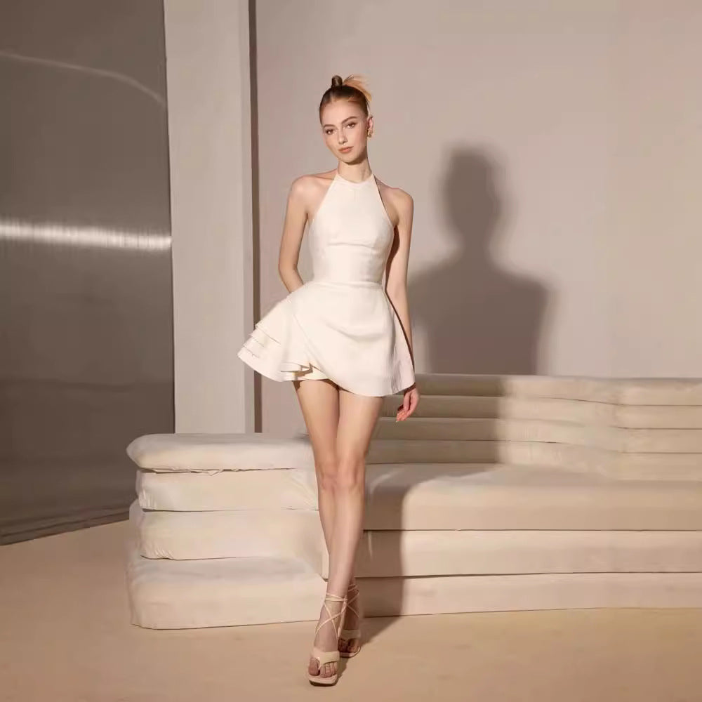 Elsa Pleated Backless Halter Mini Dress In Beige Flowering Girl