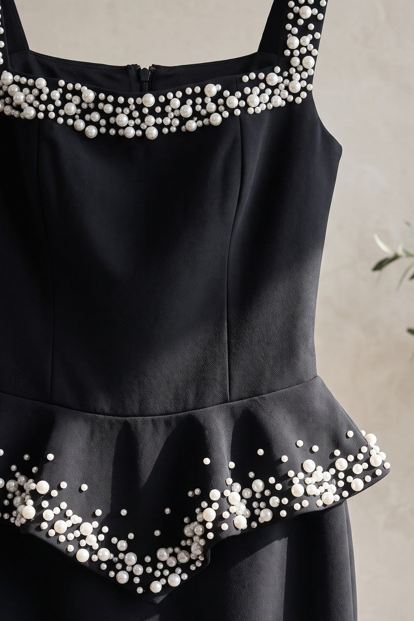 Black Heavy Crepe Column Gown with Structured Peplum and Pearl Embellishments Flowering Girl