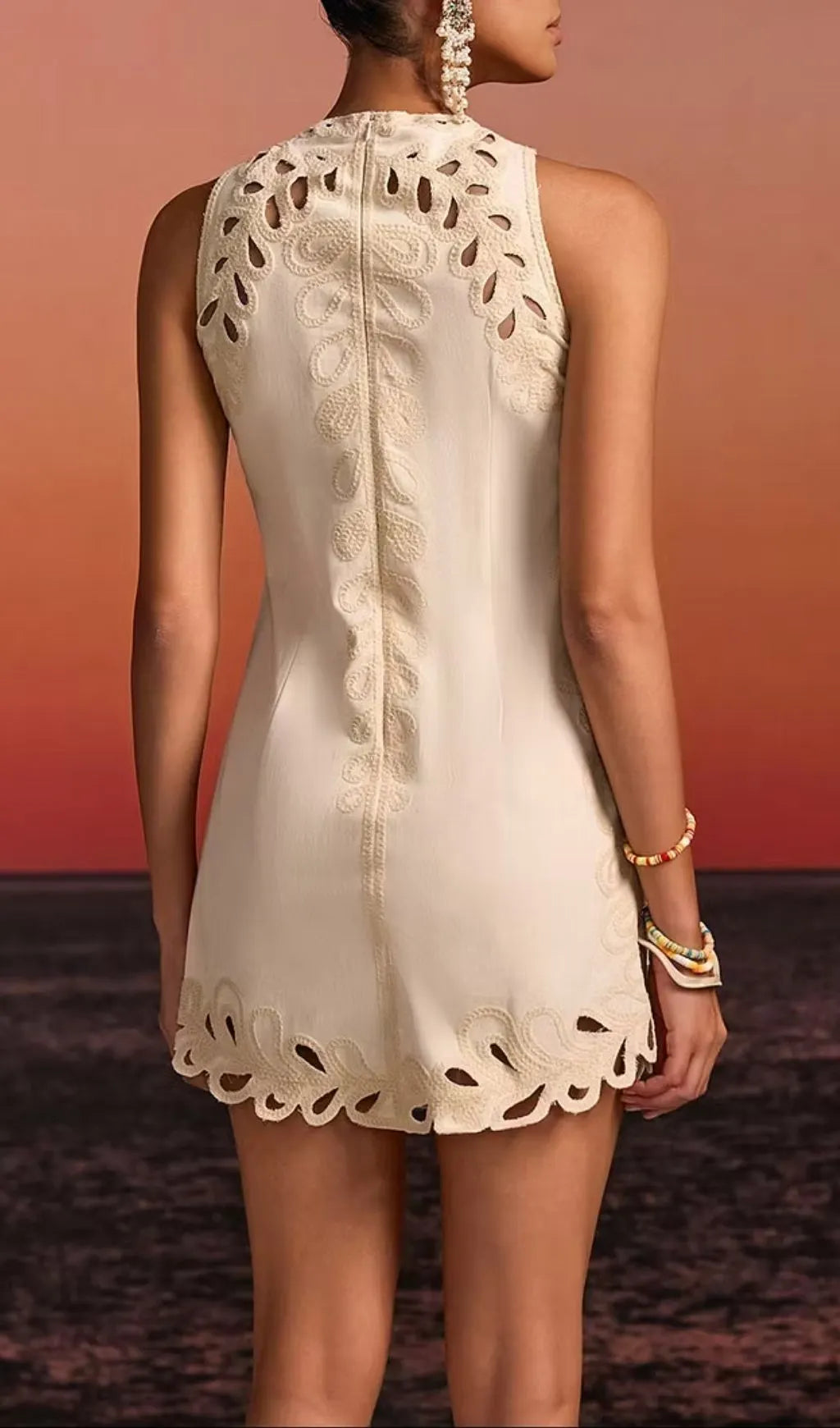 Delrix Sleeveless Cutout Mini Dress Flowering Girl