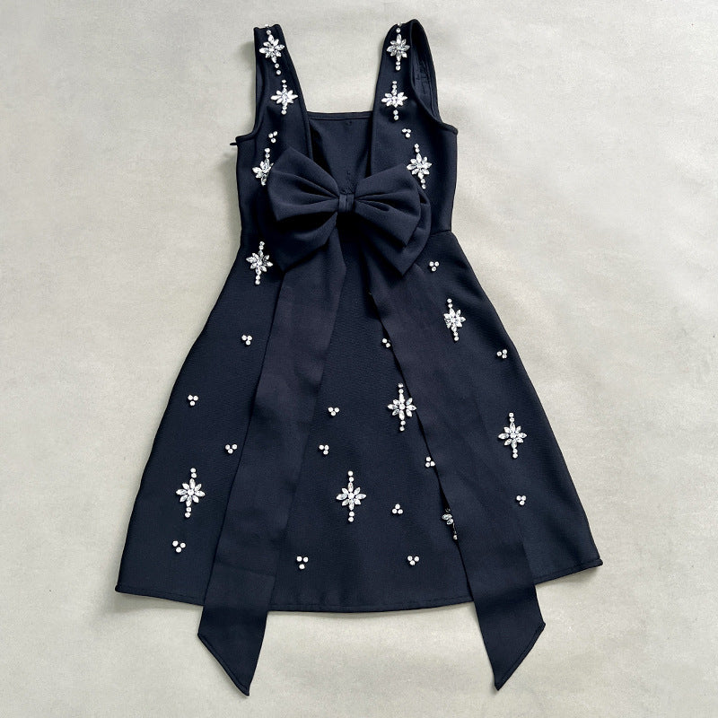 Adora Sleeveless Diamond Bow Bandage Mini Dress In Black Flowering Girl