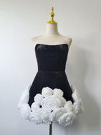 flower-embellished-hem black strapless mini dress Flowering Girl