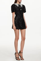 Dora Buttoned Contrast Collar Sequin Mini Dress In Black Flowering Girl