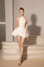 Elsa Pleated Backless Halter Mini Dress In Beige Flowering Girl