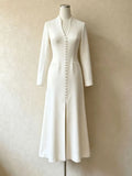 Masahide Long Sleeve Slit Maxi Dress Flowering Girl