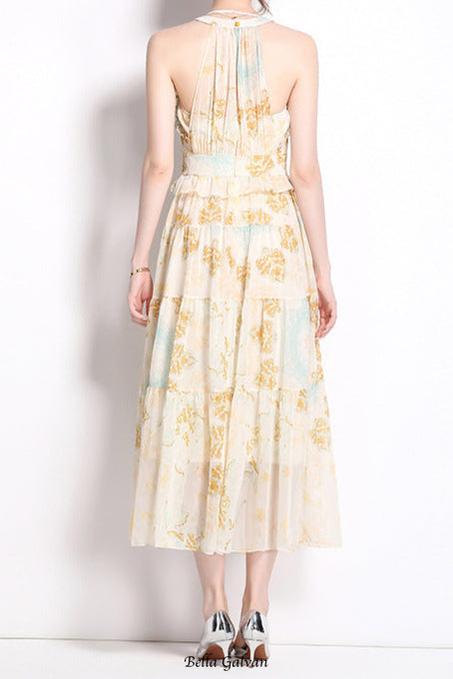 elvira print sleeveless halterneck midi dress in yellow Flowering Girl