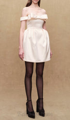 bow mini dress in beige Flowering Girl